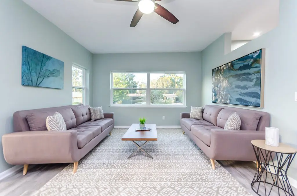 Formal seating area of the house featured in Zombie House Flipping season two episode eight, staged by MHM Professional Staging