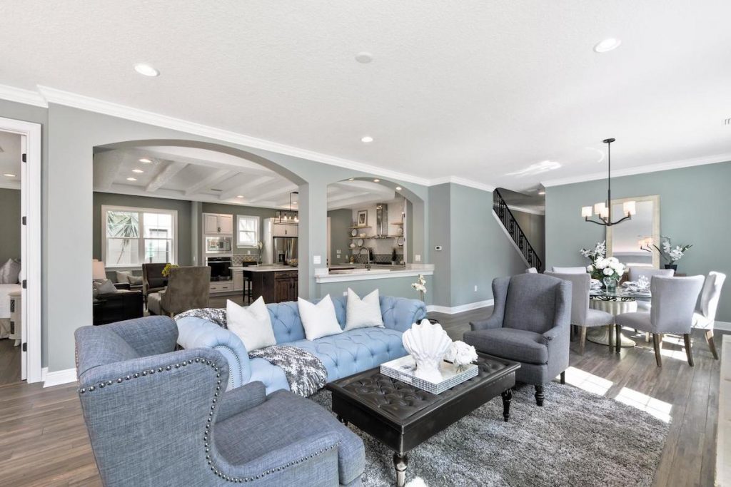 Living room with conversational seating in open floor plan.