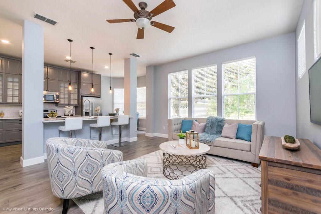 Living room with view of kitchen staged by MHM Professional Staging.